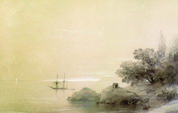 mer contre une côte rocheuse 1851 Romantique Ivan Aivazovsky russe Peinture à l'huile